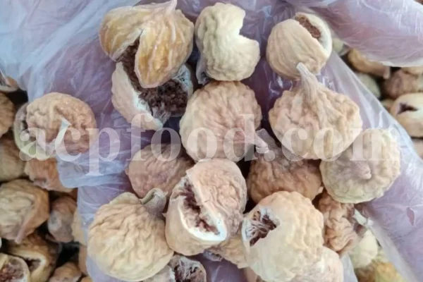 Open Iranian dried fig with visible seeds – sweet inside