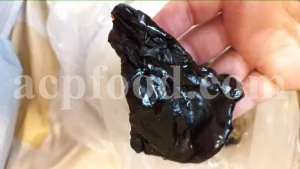 Close-up of dark mumio resin