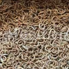 Bulk Astragalus hamosus pods for export, showing whole dried curved pods