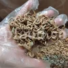 Whole dried Astragalus hamosus fruit pods